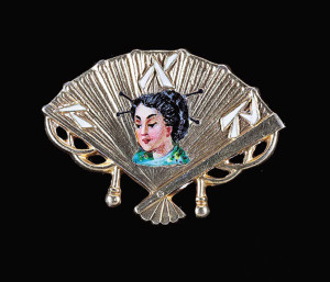 The Twelfth Night Revelers promised ‘A Night in Japan’ for their 1905 ball theme. This rare sterling silver gilt and enameled souvenir pin brought $896. Courtesy Neal Auction Co.